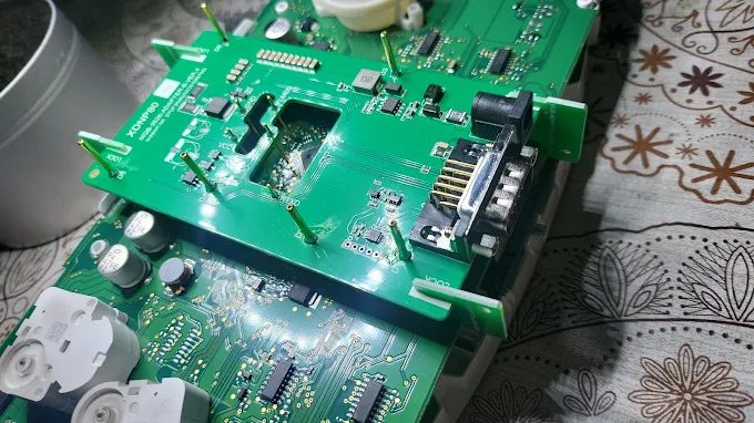 Key fob and vehicle module circuit boards opened up for repair